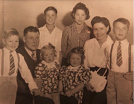 The Hahn family in the 1930s, with Lucetta being held by her father.